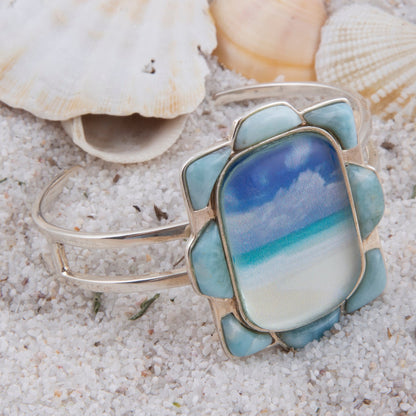 Cuff bracelet with beach scene design on sand with shells