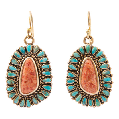 Front view of Sedona blue turquoise and orange sponge coral gold-tone bronze drop earrings