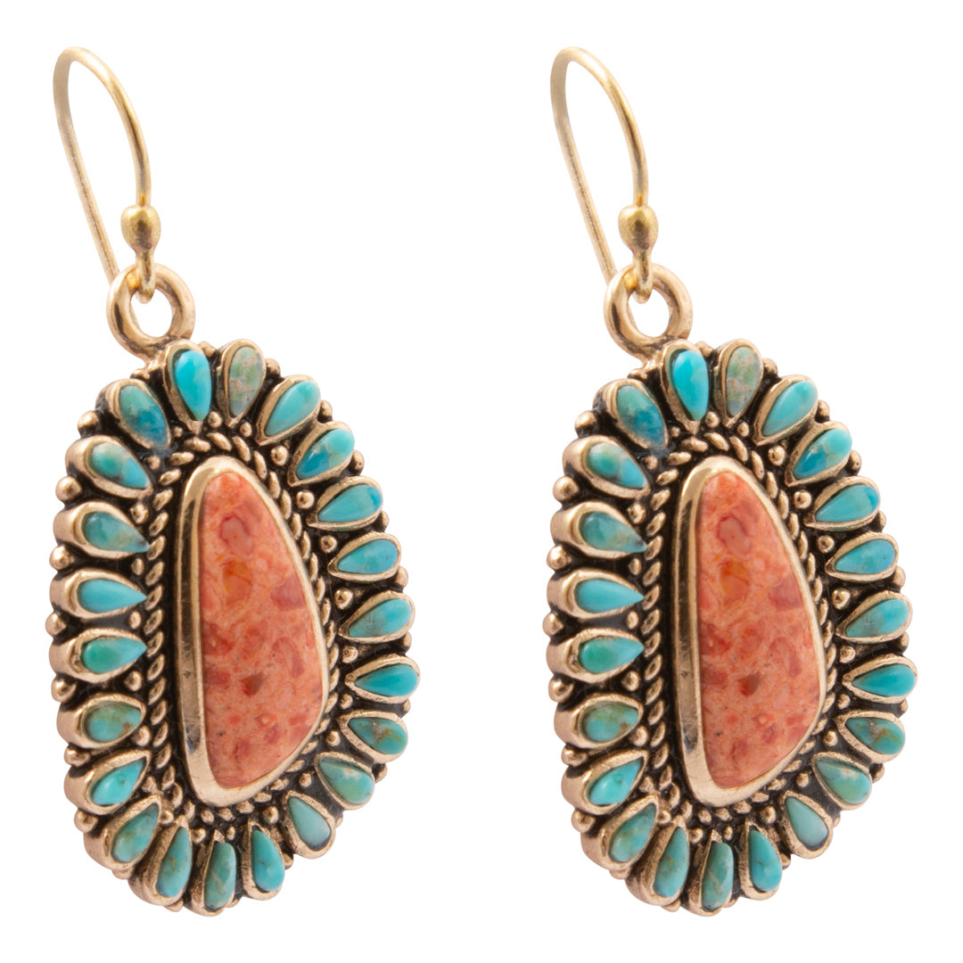 Angled side view of Sedona blue turquoise and orange sponge coral gold-tone drop earrings