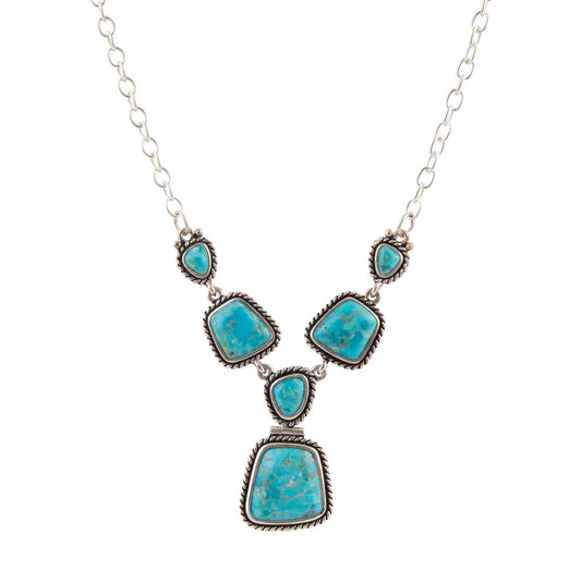 Turquoise stone necklace on a white background