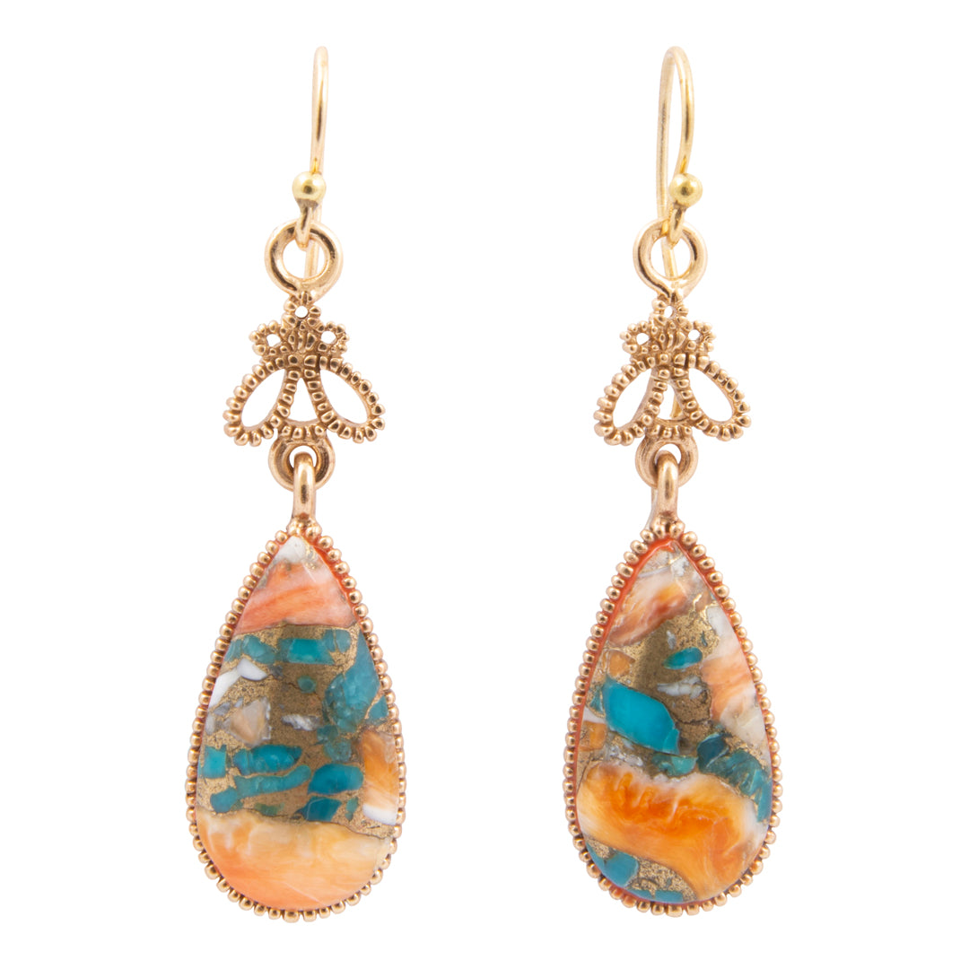 Teardrop-shaped earrings with gold hooks and colorful stone drops on a white background