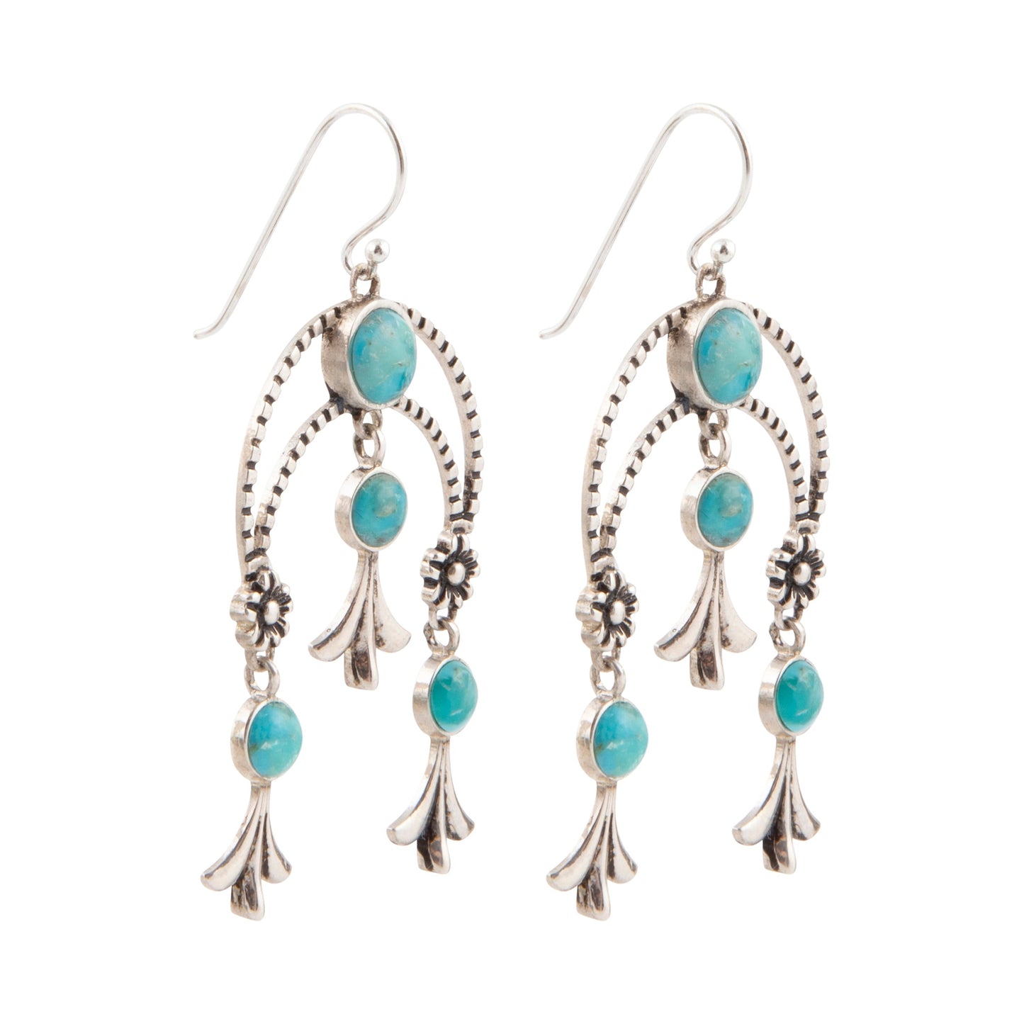 Pair of silver earrings with turquoise stones on a white background