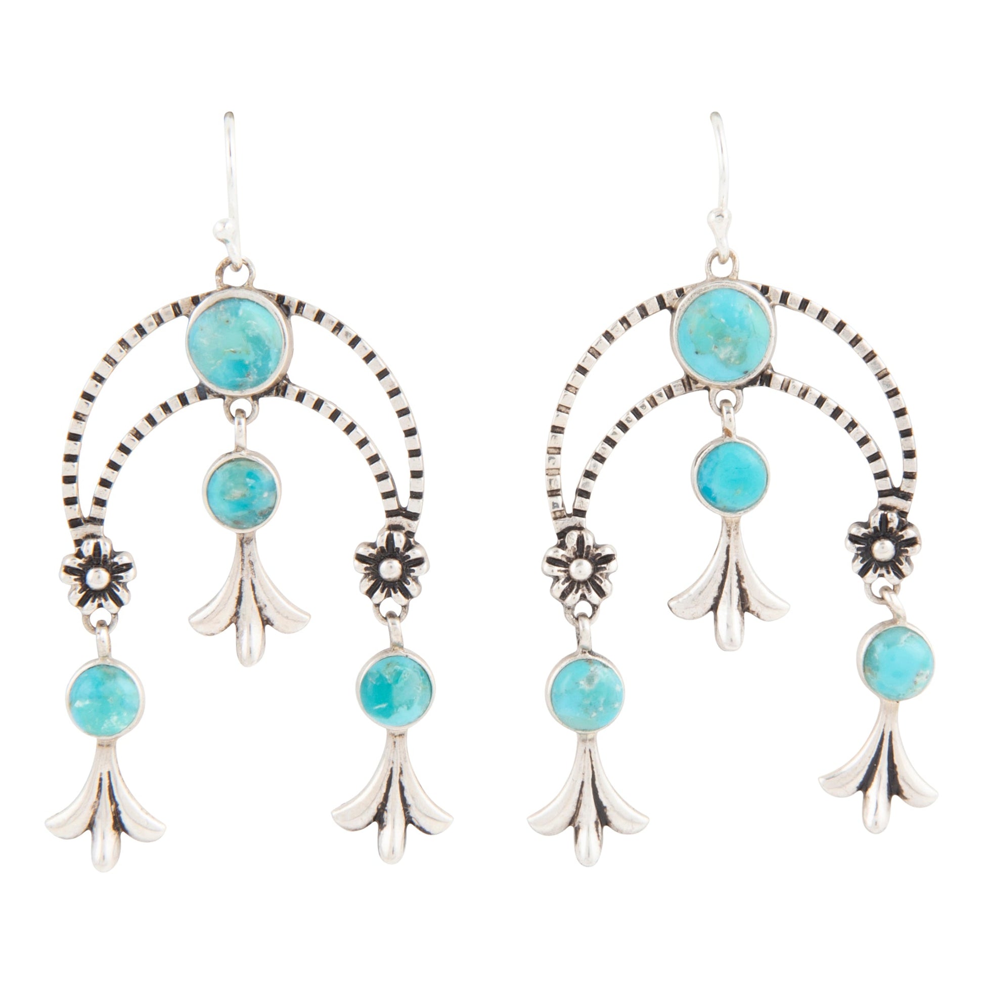 Turquoise stone and silver earring set on a white background