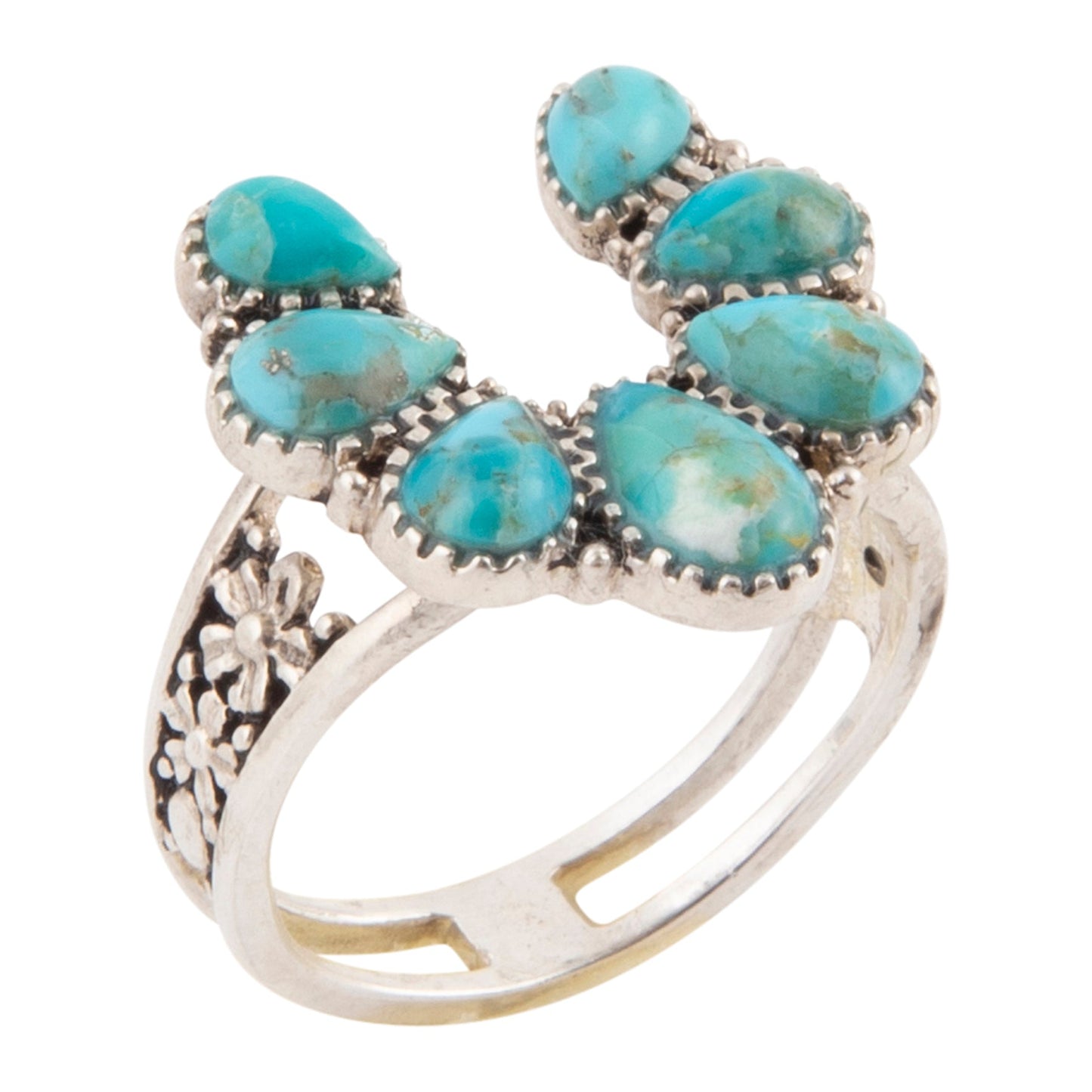 Silver ring with turquoise stones on a white background