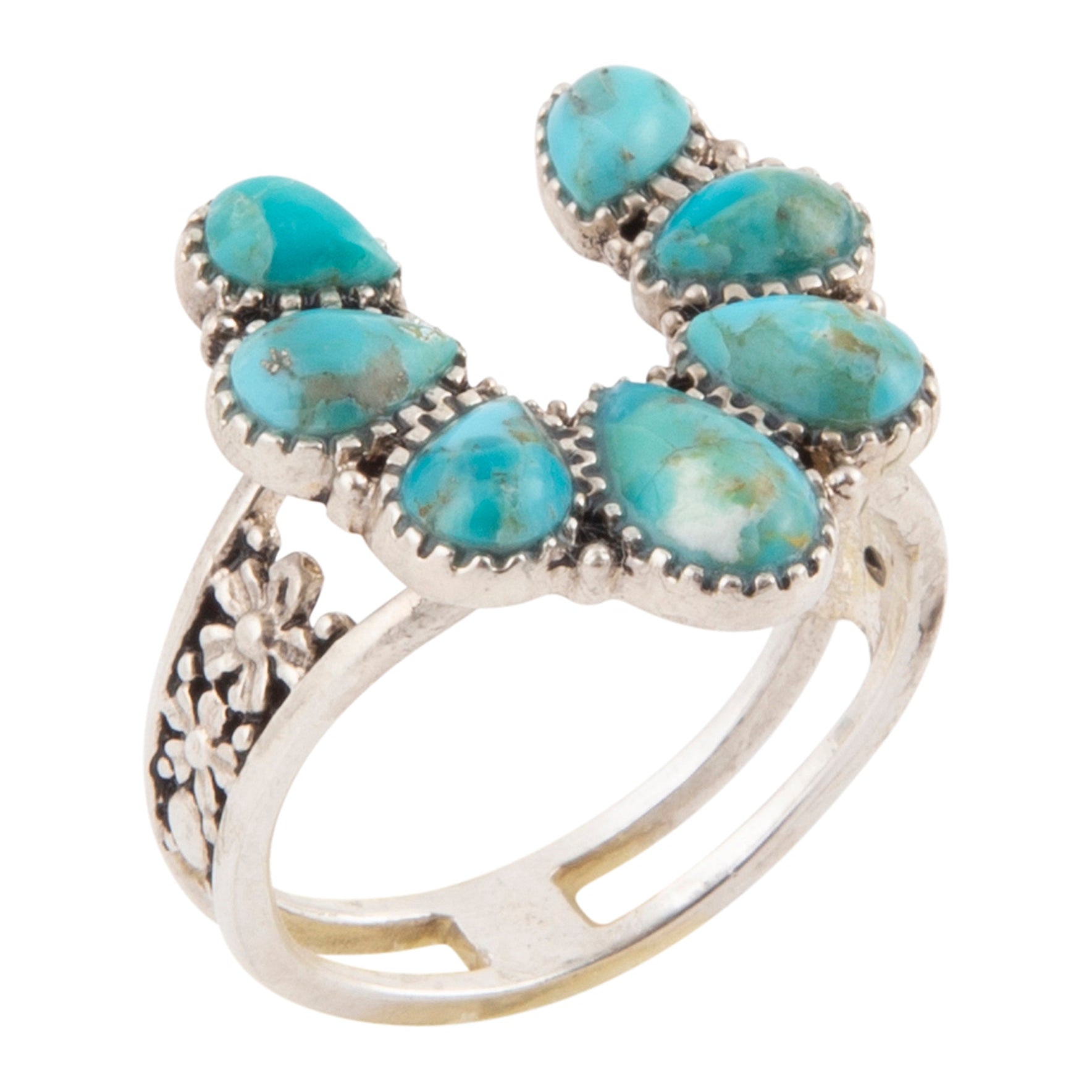 Silver ring with turquoise stones on a white background