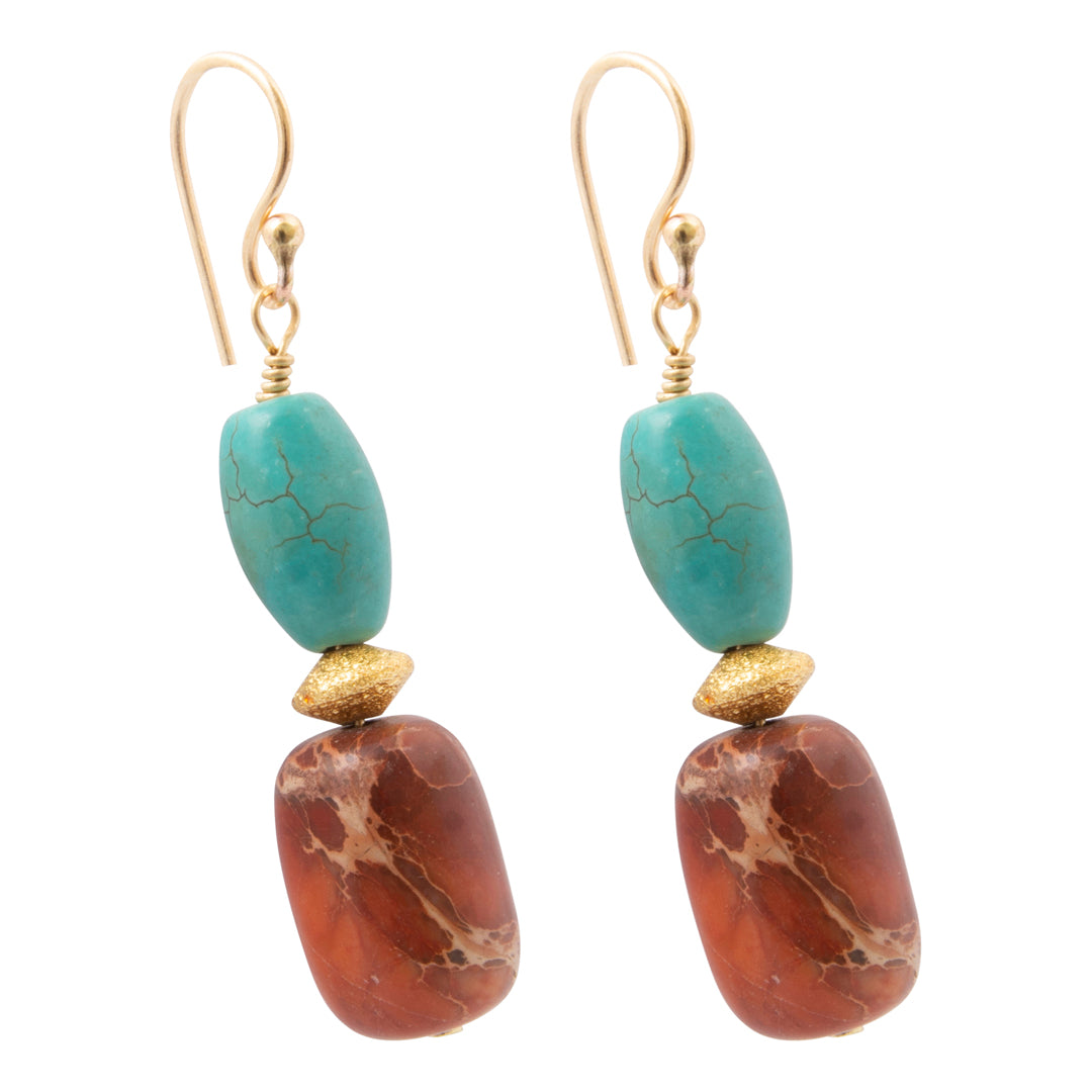 A pair of drop earrings featuring a turquoise stone bead, a textured gold spacer bead, and a larger polished reddish-brown stone bead below, set against a plain white background.
