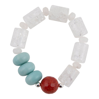 A beaded stretch bracelet featuring textured white rectangular crystals, four smooth light blue beads, and a single red faceted bead, separated by small silver spacer beads, on a solid white background.