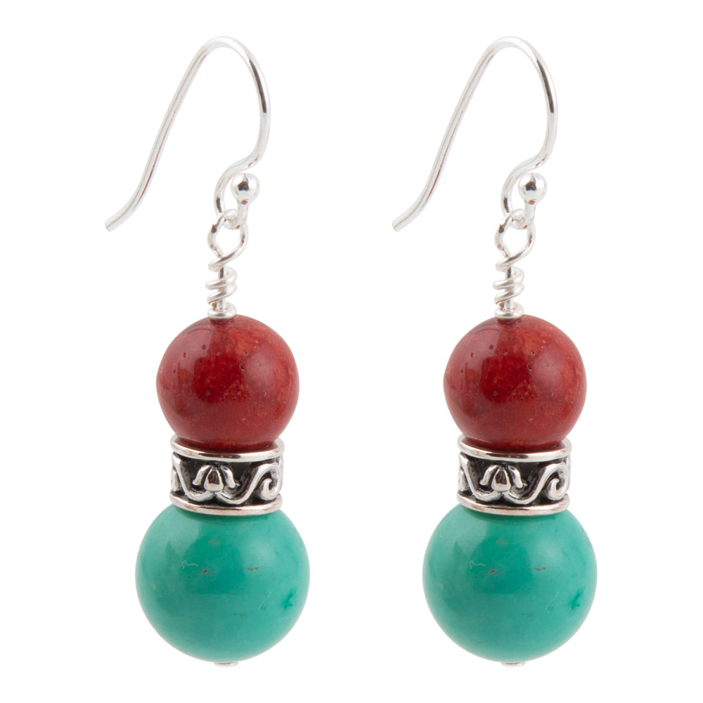A pair of silver-toned dangle earrings featuring a round red bead, an ornate silver spacer, and a larger round turquoise green bead at the bottom, shown against a plain white background.