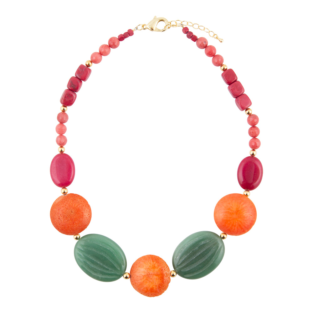 A colorful beaded necklace featuring large textured orange and green beads, smaller pink and red beads, and gold spacer rings, displayed on a clean white background.