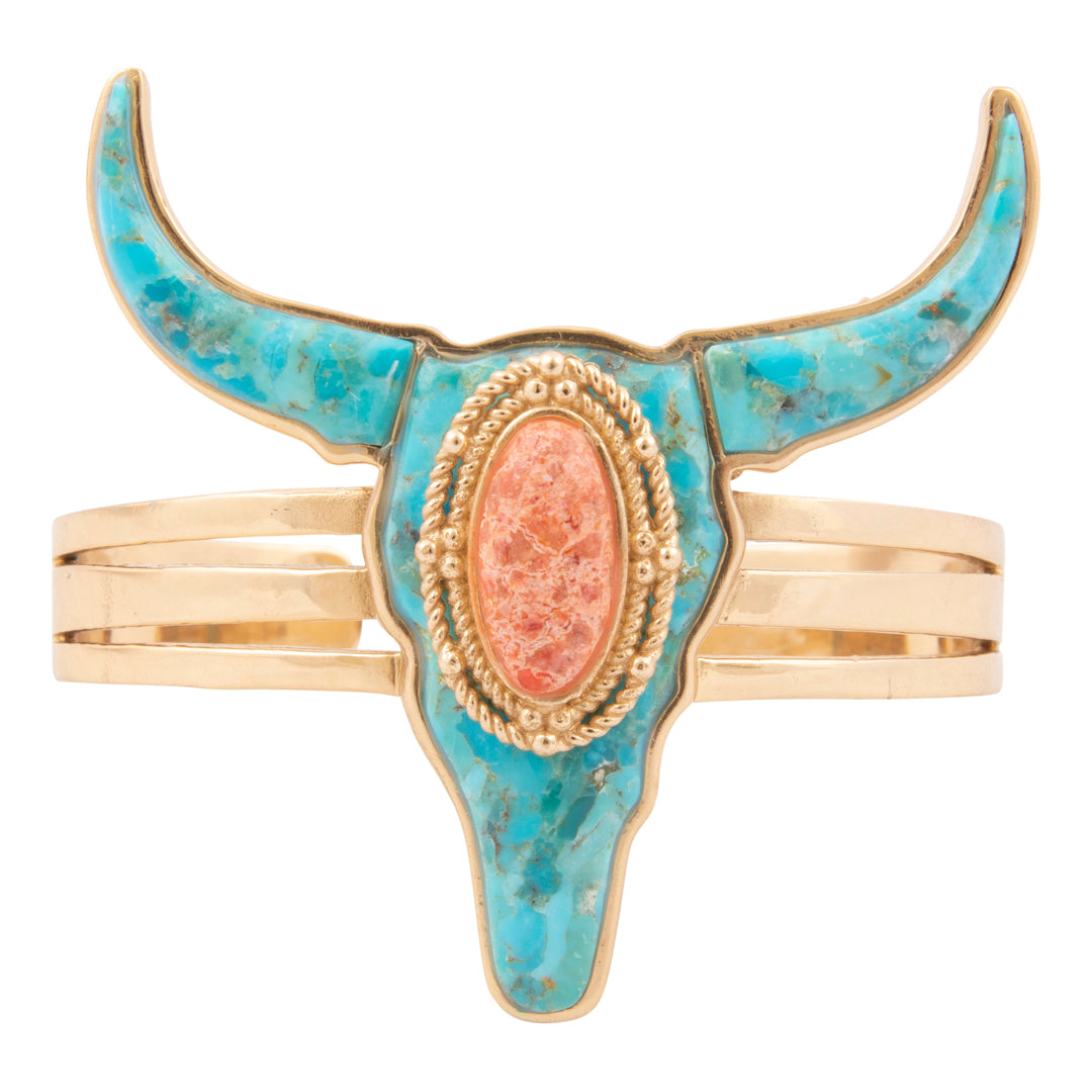 Bull head-shaped bracelet with turquoise and gold design on a white background