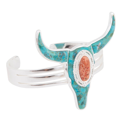 Turquoise and silver bull head-shaped cuff bracelet on a white background