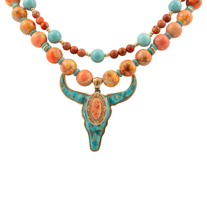 Necklace with colorful beads and a decorative pendant on a white background