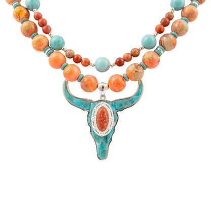 Necklace with turquoise and multicolored bead design on a white background