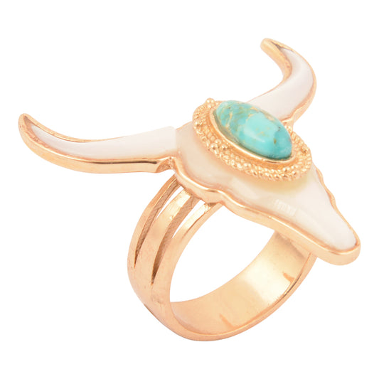 Gold ring with a turquoise stone and white bull head design on a white background
