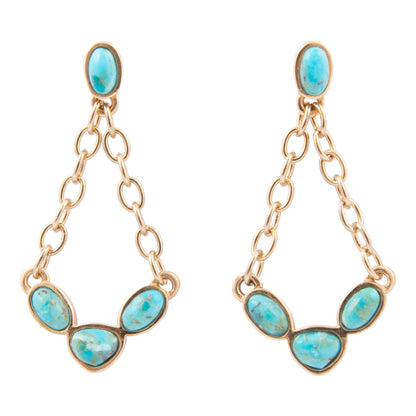 Gold chain earrings with turquoise stones on a white background