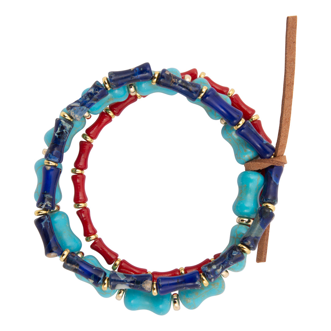 Colorful beaded bracelet with blue, red, and turquoise beads on a white background