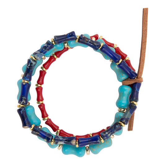 Colorful beaded bracelet with blue, red, and turquoise beads on a white background