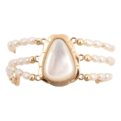 Pearl bracelet with a heart-shaped pearl center on a white background