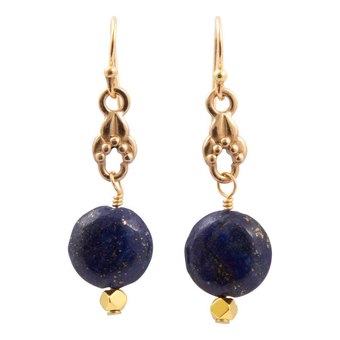 Pair of earrings with blue beads and gold accents on a white background
