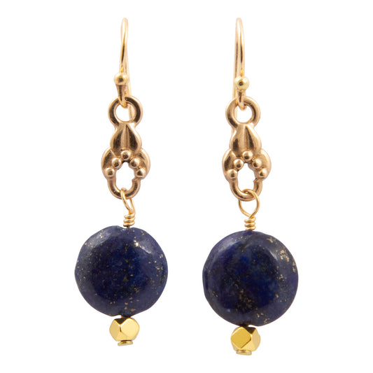 Pair of earrings with blue beads and gold accents on a white background