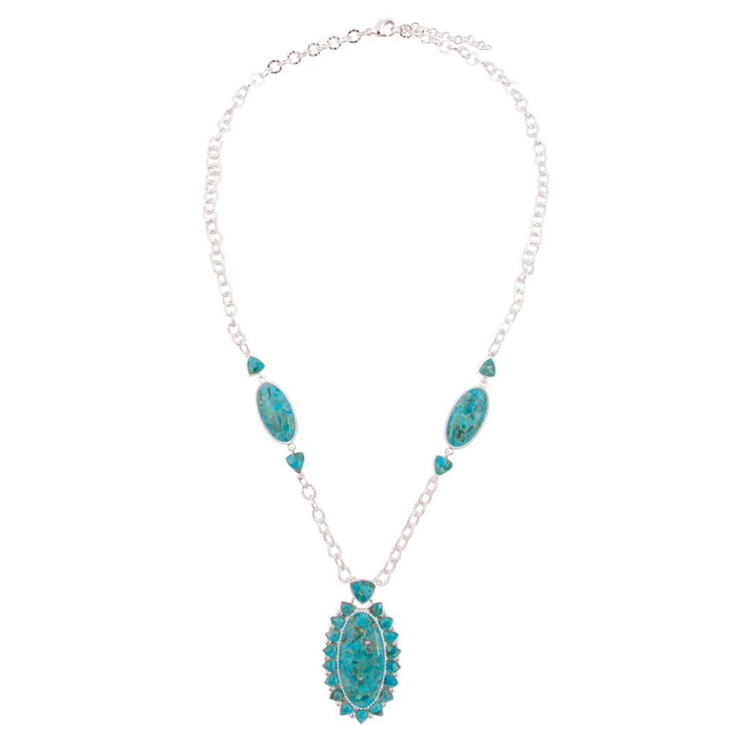 Turquoise necklace with silver chain on a white background