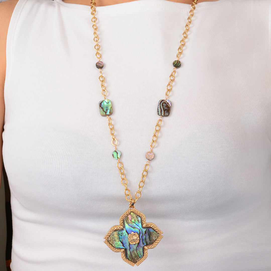 Necklace with a decorative pendant on a white background