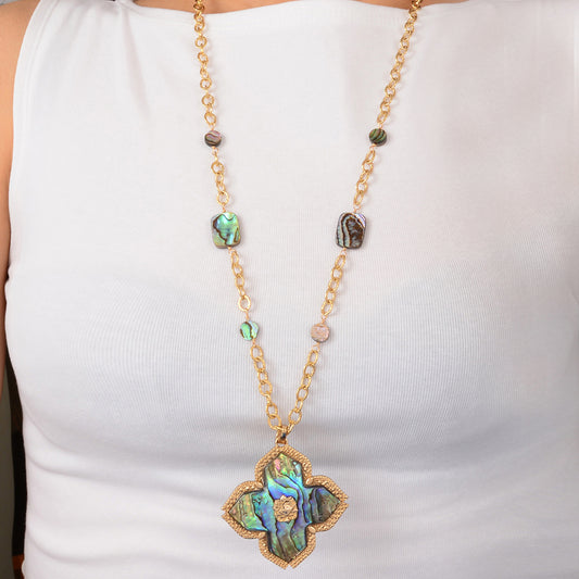 Necklace with a decorative pendant on a white background