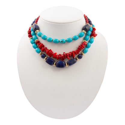 Colorful beaded necklace on a white mannequin bust