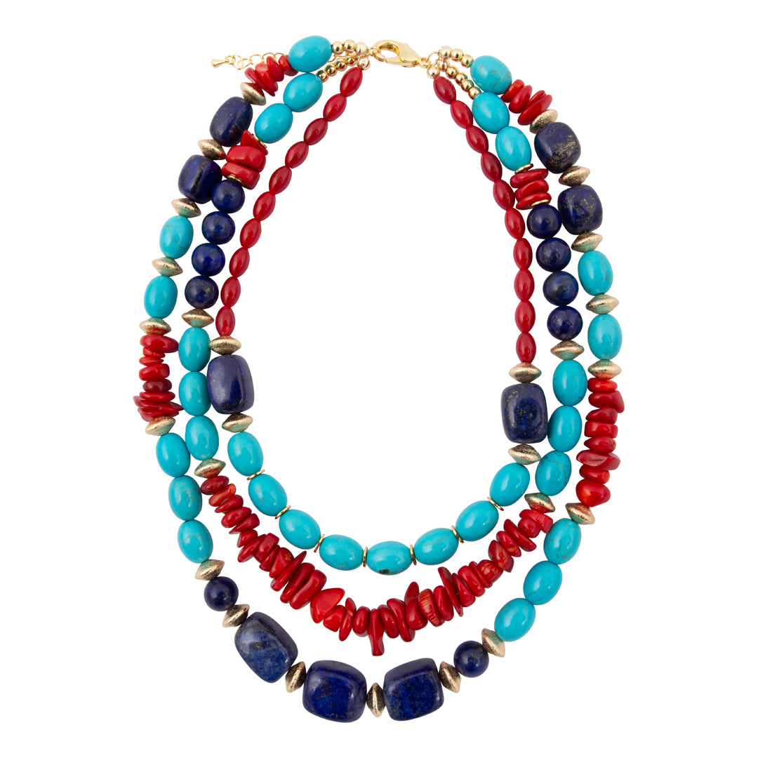 Stack of colorful beaded necklaces on a white background