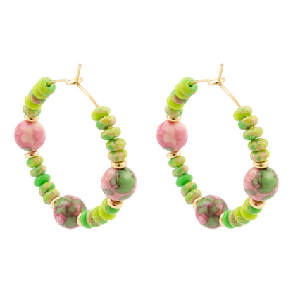 Hoop earrings with green and pink bead accents on a white background