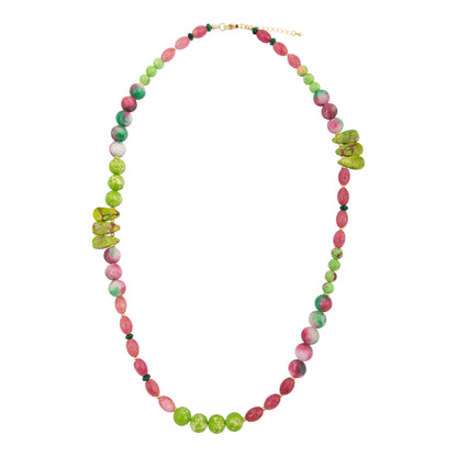 Necklace with pink and green beads on a white background