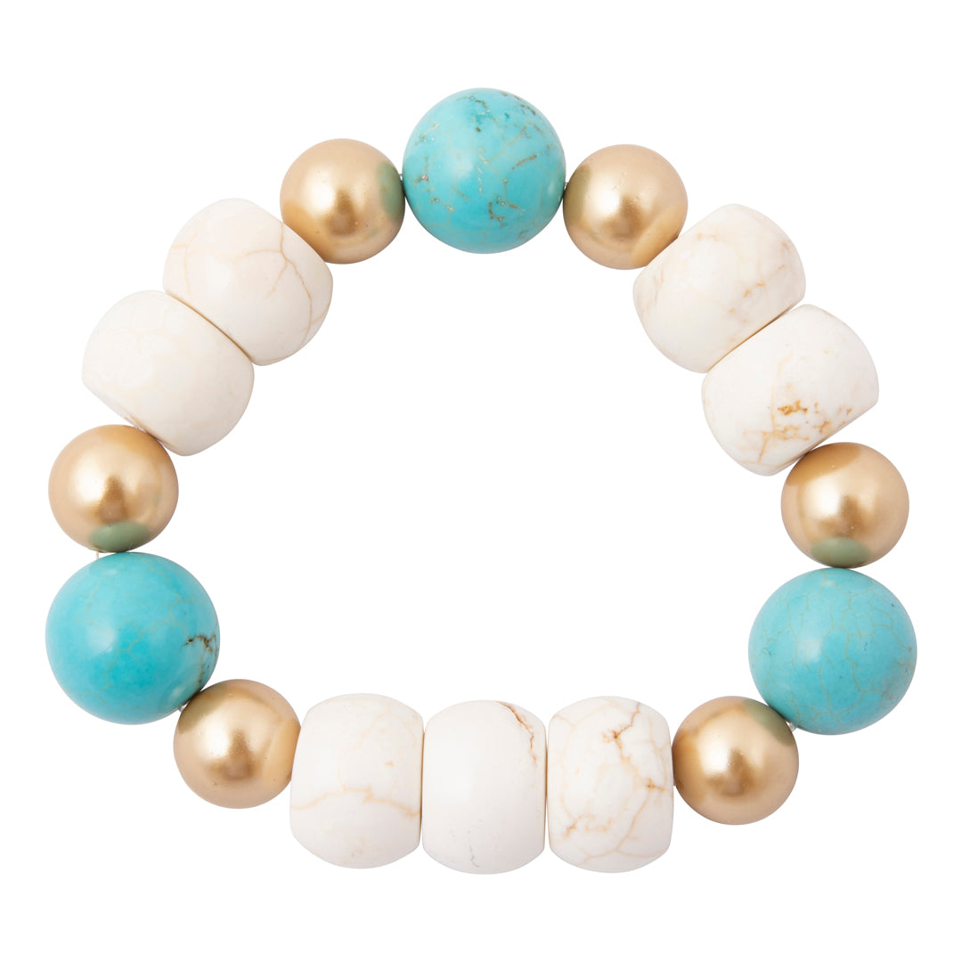 A beaded stretch bracelet featuring alternating turquoise blue-green stones, matte white marbled beads, and metallic gold round beads, shown on a solid white background.