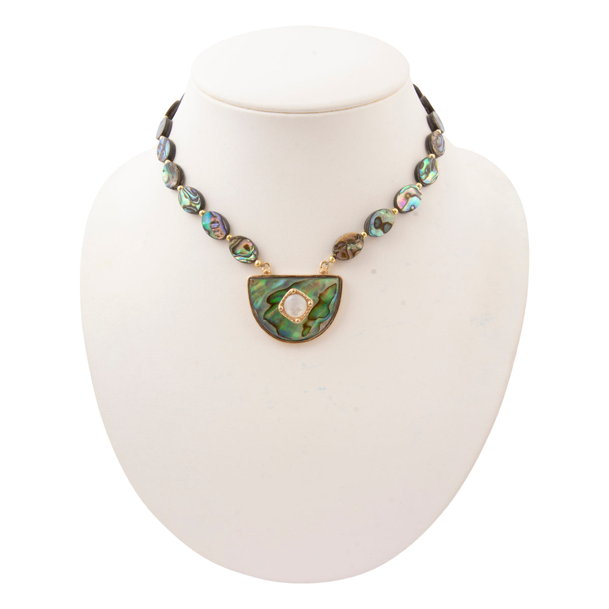 A necklace displayed on a white mannequin bust, featuring a strand of iridescent abalone shell beads and a large semicircular green abalone pendant with a gold-tone border and central white pearl.