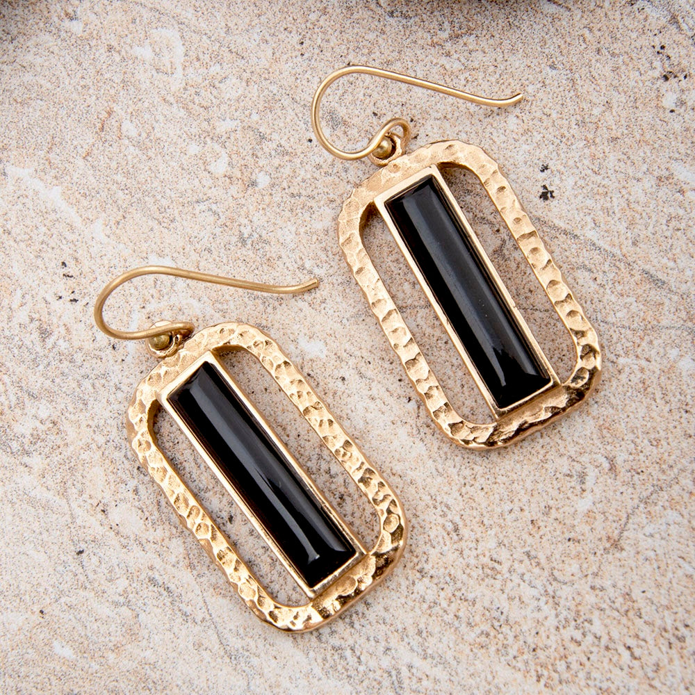 Barse Linear black onyx bronze drop earrings, styled lifestyle view.
