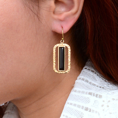 Barse Linear black onyx bronze drop earrings, close model scale view.