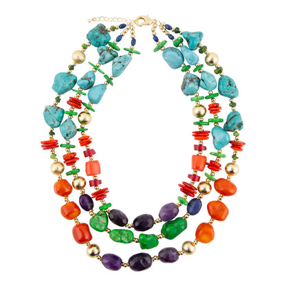 A multi-strand beaded necklace featuring turquoise, coral, purple, green, and orange beads with gold-toned spacer beads and a gold clasp, displayed on a clean white background.