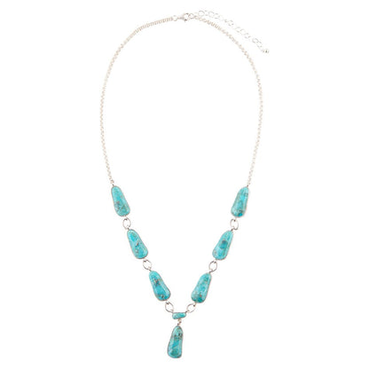 Turquoise bead necklace on a white background