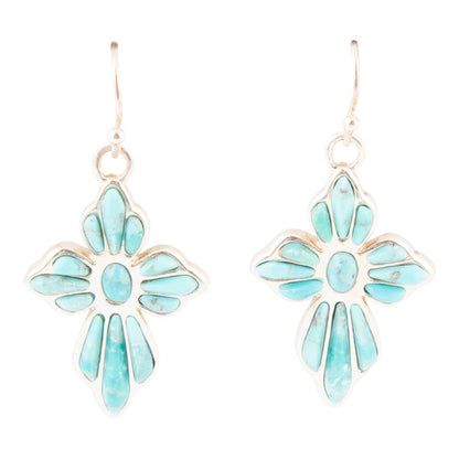 Turquoise flower-shaped earrings on a white background