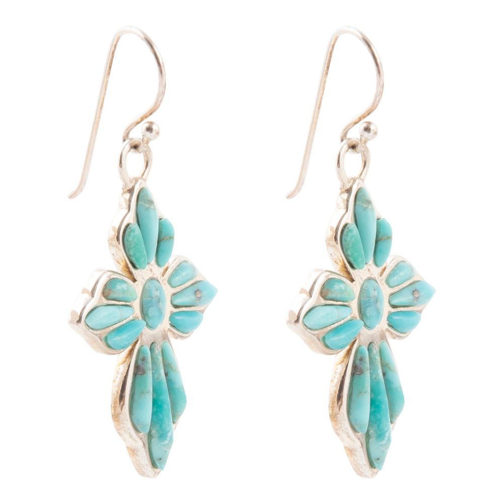 Turquoise floral earrings on a white background