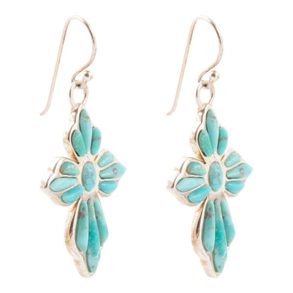 Turquoise floral earrings on a white background