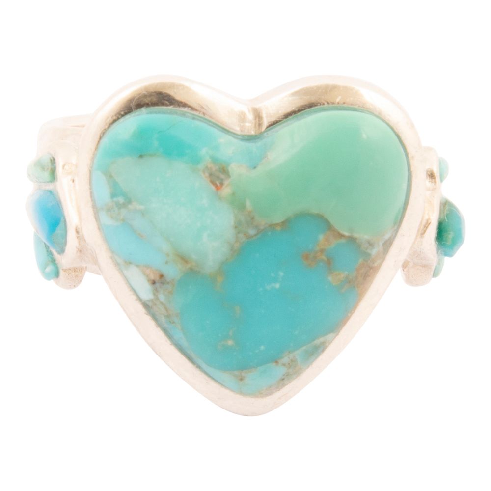 Heart-shaped turquoise stone ring with gold outline on a white background