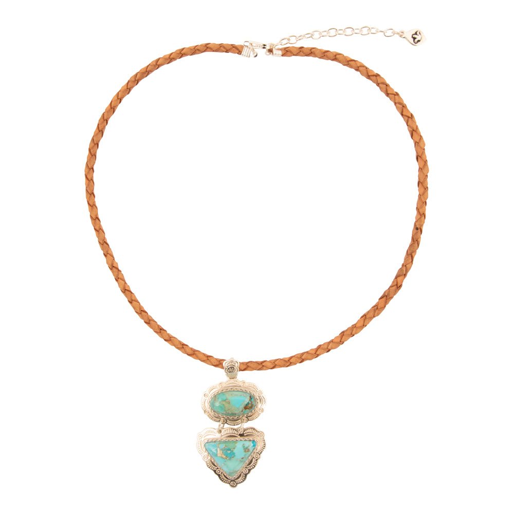 Necklace with turquoise heart-shaped pendants on a braided cord against a white background
