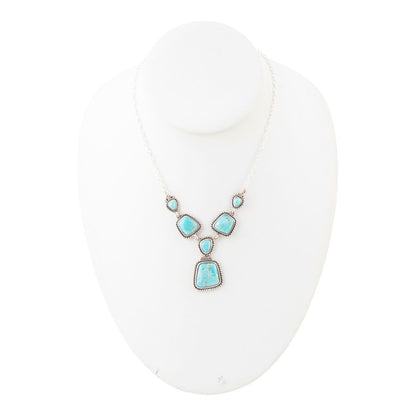 Turquoise necklace on a white background