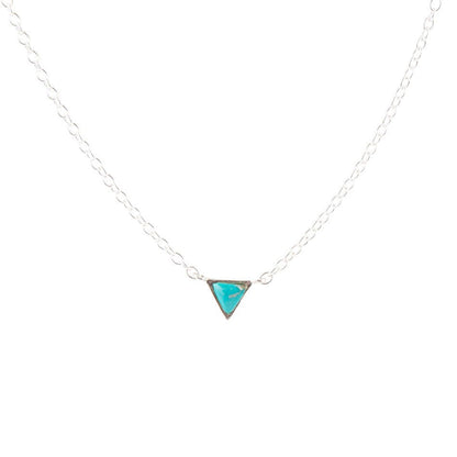 Necklace with a triangular turquoise pendant on a white background
