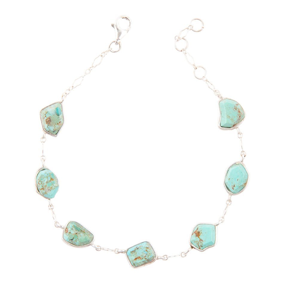 Turquoise stone necklace on a white background