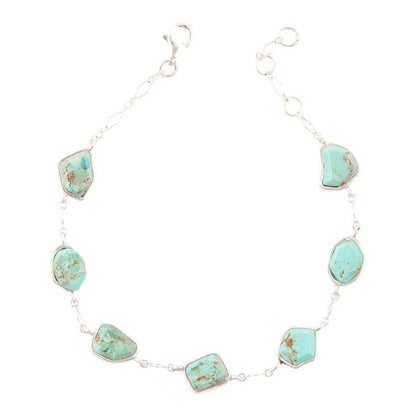 Turquoise stone necklace on a white background